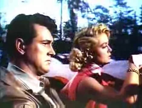 Dorothy Malone - Screenshot of Rock Hudson and Dorothy Malone from the trailer for the film w:en:Written on the Wind