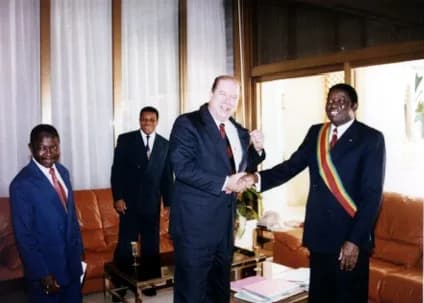 Étienne Gnassingbé Eyadéma - President Gnassingbé Eyadéma gave Billy Davis a pin representing his country.