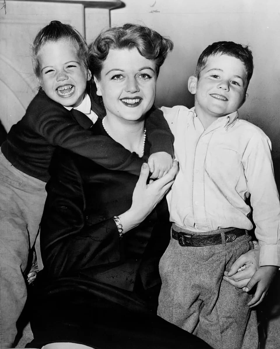 Angela Lansbury - Angela Lansbury, three-quarter length portrait, seated with daughter Deidre and son Anthony / World Telegram &amp; Sun photo by Roger Higgins.