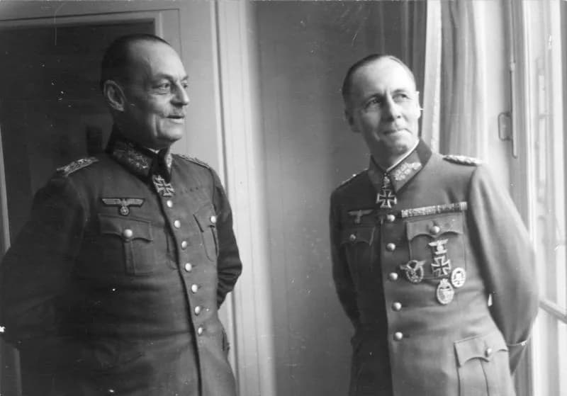 Gerd von Rundstedt - Information added by Wikimedia users.
Conversation between Commander in Chief West Gerd von Rundstedt and Field Marshall Erwin Rommel at the George V hotel in Paris, France.