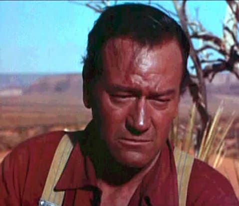 John Wayne - This image is a screenshot from a public domain movie's trailer. Trailers for movies released before 1964 are in the Public Domain because they were never separately copyrighted.