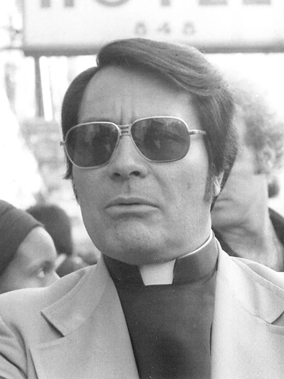 Jim Jones - Rev. Jim Jones at an anti-eviction rally Sunday, January 16, 1977 in front of the International Hotel, Kearny and Jackson Streets, San Francisco Photo by Nancy Wong