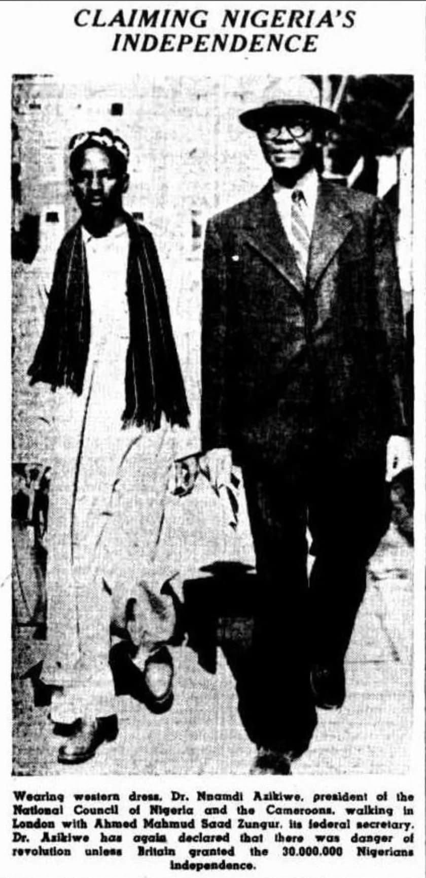 Nnamdi Azikiwe - "Wearing western dress, Dr. Nnamdi Azikiwe, president of the National Council of Nigeria and the Cameroons, walking in London with Ahmed Mahmud Saad Zungur, its federal secretary. Dr.