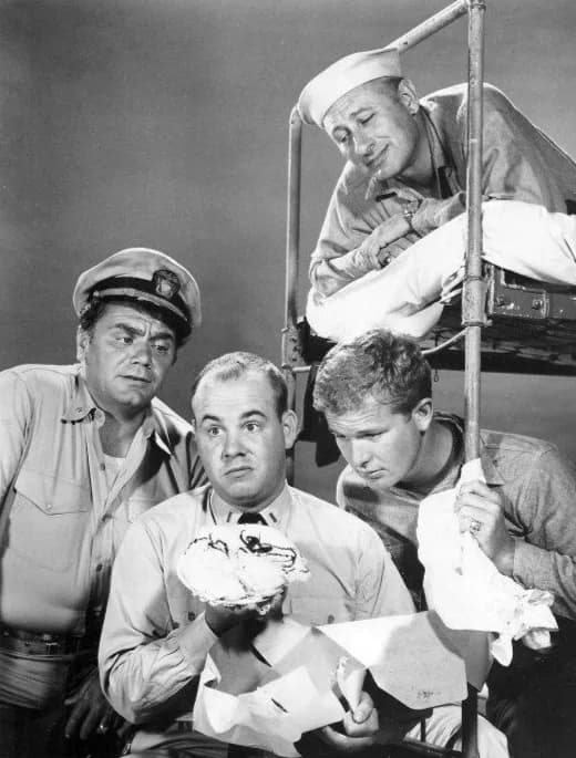 Ernest Borgnine - Photo from the television program McHale's Navy.  In the photo, McHale (Ernest Borgnine), Gruber (Carl Ballantine, in top bunk), and Christie {Gary Vinson, seated on lower bunk), hav