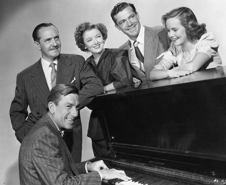 Teresa Wright - The Best Years of Our Lives, 1946 (publicity still)
Standing, L-R: Frederick March, Myrna Loy, Dana Andrews, Teresa Wright; seated at piano: Hoagy Carmichael.