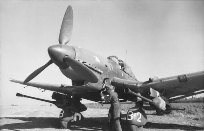 Hans-Ulrich Rudel - Junkers Ju 87 "Stuka" dive bomber with 3.7 cm anti-tank guns under the wings. The aircraft, Hans-Ulrich Rudel's, is being started with a hand crank