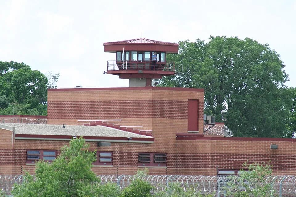 Jeffrey Dahmer - The w:Columbia Correctional Institution near w:Portage, Wisconsin with an occupied guard tower as photographed from Interstate 39.