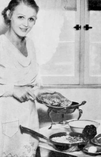 Gloria Stuart - Gloria Stuart posed cooking in Photoplay, 1933