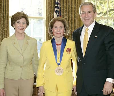 Cyd Charisse - 2006 National Medal of Arts recipient and dancer, actress Cyd Charisse accepts her award from President George W. Bush and Mrs. Laura Bush in an Oval Office ceremony on November 9, 2006