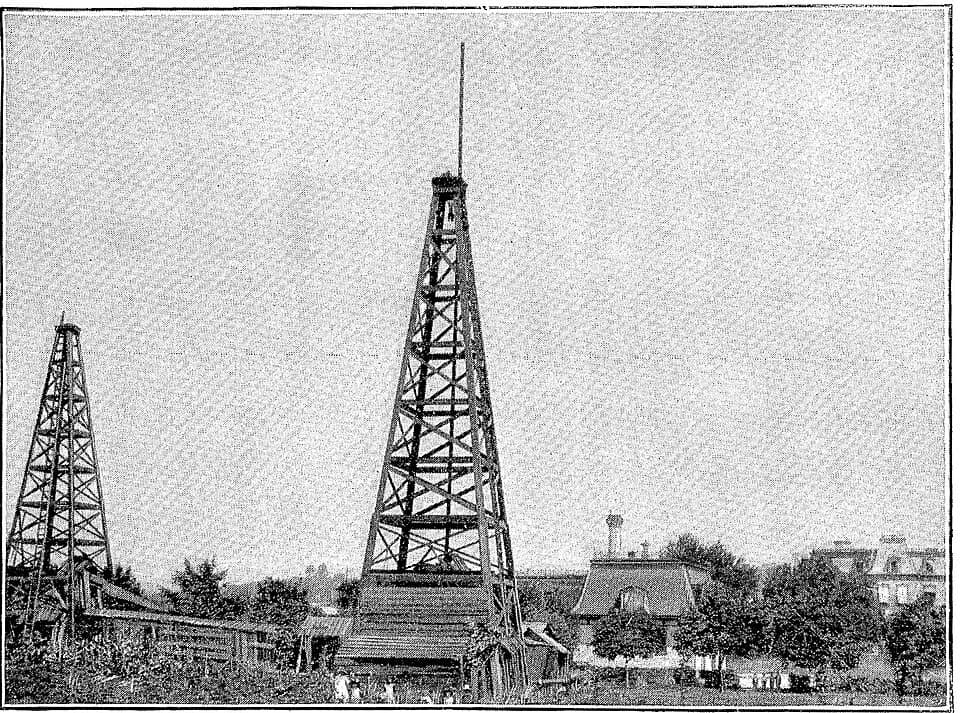 George Westinghouse - A daytime photograph of the George Westinghouse gas derrick Number 1, located in present-day Westinghouse Park.  It shows two derricks and ancillary buildings.