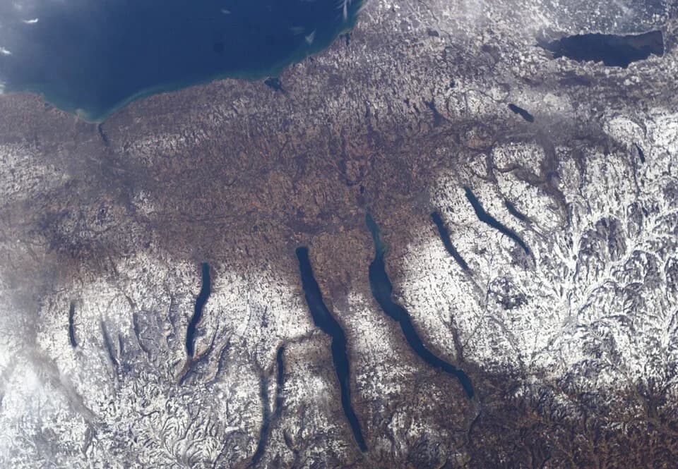 Lewis H. Morgan - New York's Finger Lakes

A late fall snowstorm frosted the hills of the Finger Lakes region of western and central New York in early December. Shapes of the snow-covered hills are ac