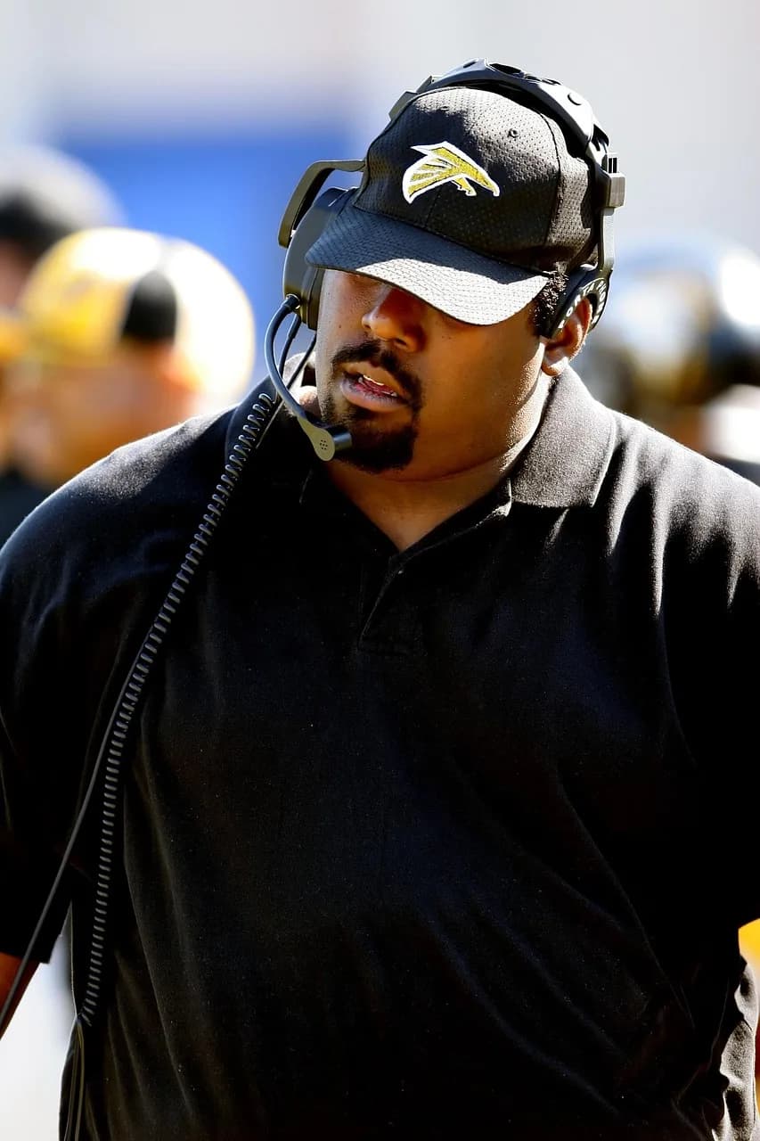 Tomohiko Ikoma — coach, football coach, coaching, football, sport, team, male, outdoors, american, head set, communications, adult, person, american football, high school football, texan, black school, black team, black community, black football, black communication, black sports, football coach, football coach, football coach, football coach, football coach