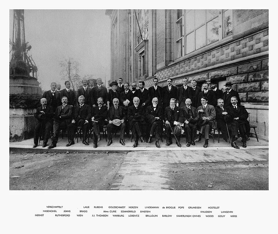 Wilhelm Wien - Second Solvay Conference on Physics, Brussels, 1913. Standing (L-R): F. Hasenöhrl, J.-É. Verschaffelt, J. Jeans, W. H. Bragg, M. von Laue, H. Rubens, M. Curie, R. Goldschmidt, A. Sommer