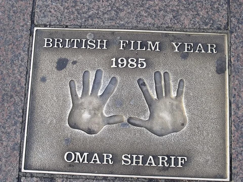Omar Sharif - The area of London where UK film premieres take place. With loads of cinemas.
Various hand prints in Leicester Square of various film stars.
These ones were done in 1985 during the Briti
