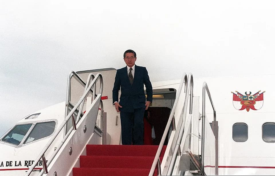 Alberto Fujimori - Alberto Fujimori, the President of Peru, emerges from his aircraft moments after arriving in Prince George's County, Maryland, in October 1998.