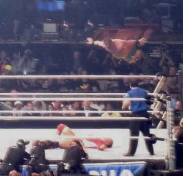 Chris Benoit - Chris Benoit performing his Diving Headbutt finisher to Montel Vontavious Porter at WrestleMania 23. (Cropped from flickr)