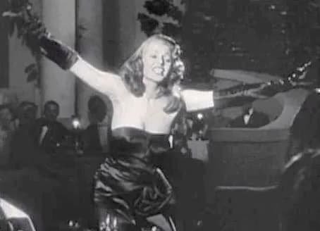 Rita Hayworth - Screenshot of Rita Hayworth as Gilda performing "Put The Blame On Mame" in the trailer for the film Gilda.