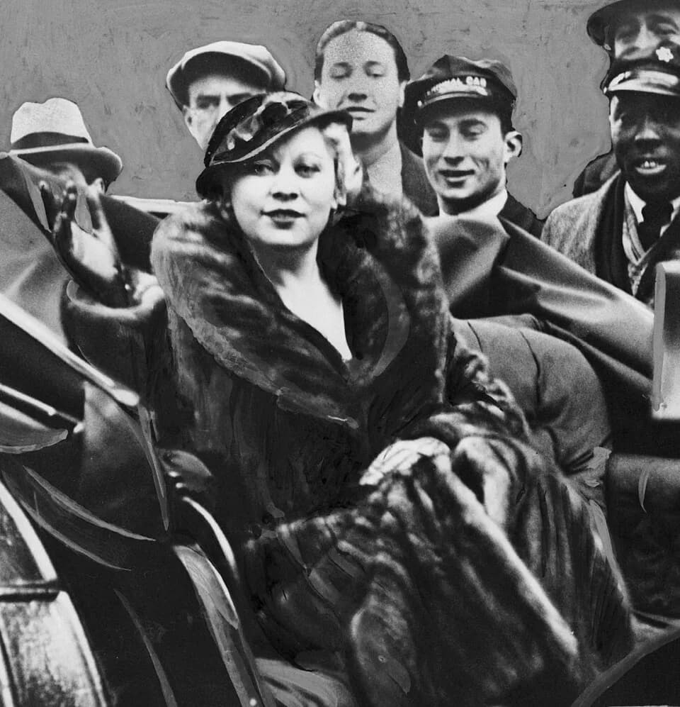 Mae West - Mae West. Library of Congress description: "Diamond L'il rides home from Hollywood... / World Telegram photo. Mae West, riding in a carriage, on her return from Hollywood." Cropped from I