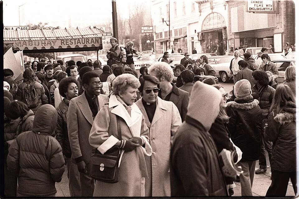 Jim Jones - Dorothy von Beroldingen (center) with San Francisco Housing Commissioner Reverend Jim Jones at an anti-eviction protest in front of the International Hotel (the I-Hotel, 848 Kearny Street