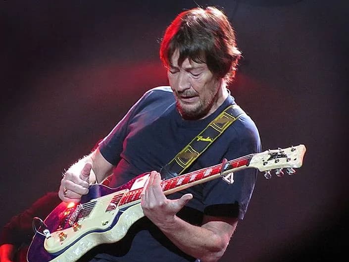 Chris Rea - Chris Rea playing slide/bottleneck on his Italia Maranello Classic Blue Sparkle! at the Heineken Music Hall, Amsterdam, The Netherlands, March 5th 2010 during the 2010 Still So Far To Go T