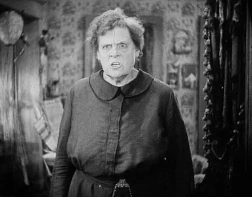 Marie Dressler - Frame from the public domain trailer for MGM's 1930 film Min and Bill showing an angry Marie Dressler