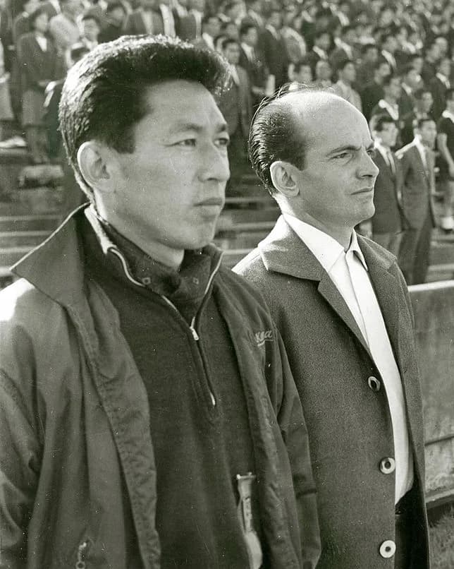 Ken Naganuma - Coach Dettmar Cramer (right) and Ken Naganuma of Japan looks on during the Tokyo International Sports competition match between Japan and Vietnam at Prince Chichibu Rugby Stadium on Oct