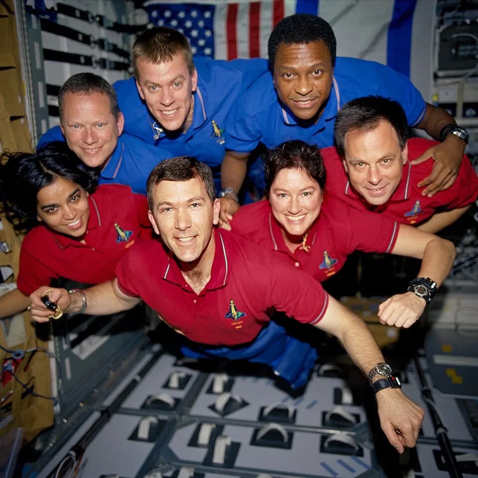 Ilan Ramon - The STS-107 crewmembers strike a ‘flying’ pose for their traditional in-flight crew portrait in the SPACEHAB Research Double Module (RDM) aboard the Space Shuttle Columbia. From the left