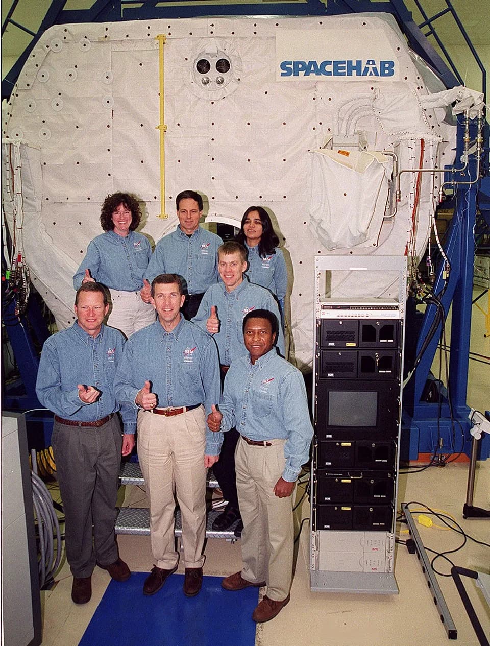 Ilan Ramon - Taking part in In-Flight Maintenance training, the STS-107 crew poses in front of the SPACEHAB Double Module. In back are Mission Specialist Laurel Clark, Payload Specialist Ilan Ramon of