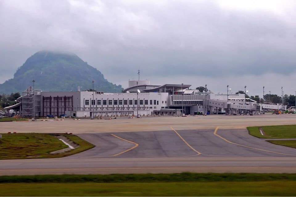 Nnamdi Azikiwe - Nnamdi Azikiwe International Airport in Abuja. An early morning view of the International Terminal at Abuja, the Federal Capital of Nigeria. Shot while taking off on flight BA 082 to