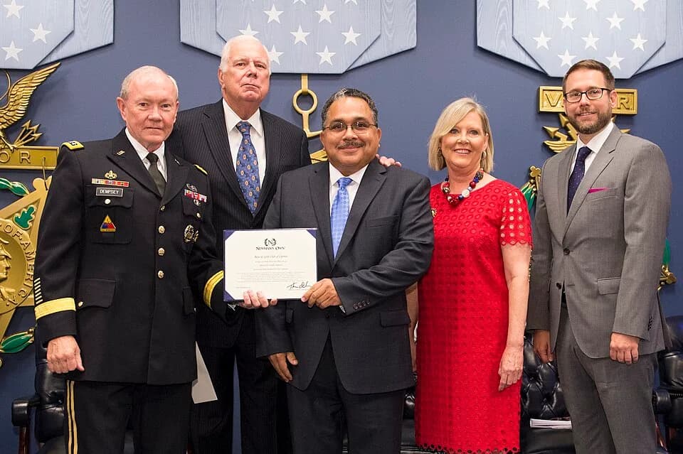 Paul Newman - Chairman of the Joint Chiefs of Staff U.S. Army Gen. Martin E. Dempsey, left, poses for a photo with a representative of the Boys and Girls Club of Cypress, Calif., center, during the 15