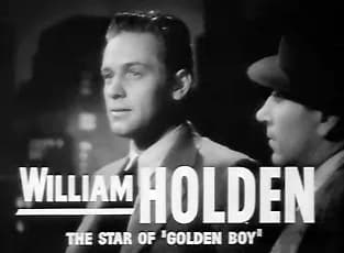 William Holden - Screenshot of William Holden from the trailer for the film Invisible Stripes.