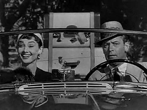 William Holden - Screenshot of Audrey Hepburn and William Holden from the trailer for the film w:en:Sabrina (1954 film)