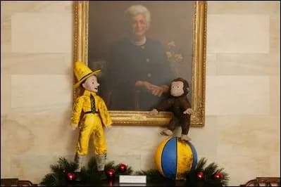 Barbara Bush - The White House 2003 Christmas decoration using the children's picture books Curious George as the theme.