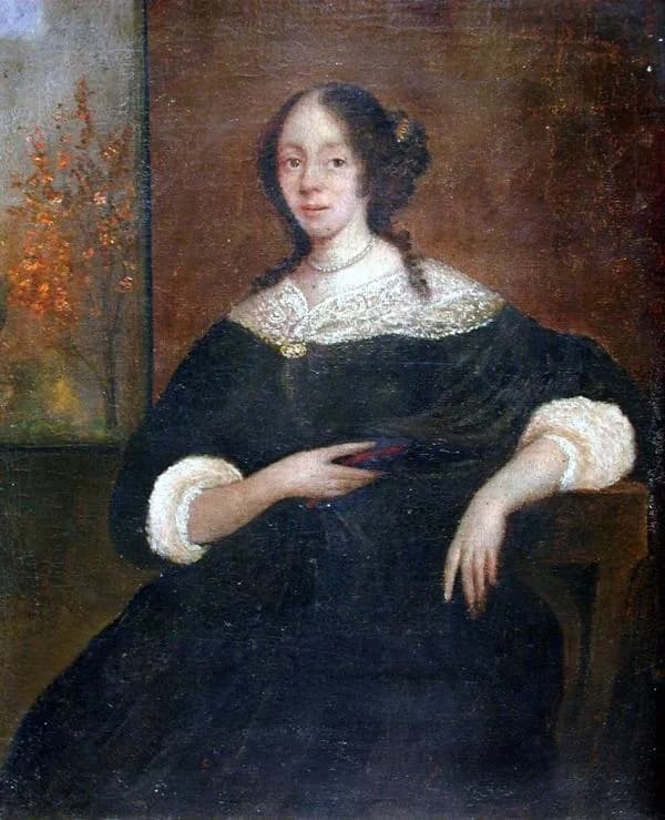 Benjamin Franklin - The image is of a young woman seated in a chair. Her chestnut hair is curled, gathered in a cluster at the back of her neck; tendrils fall on both shoulders. At her neck is a pearl