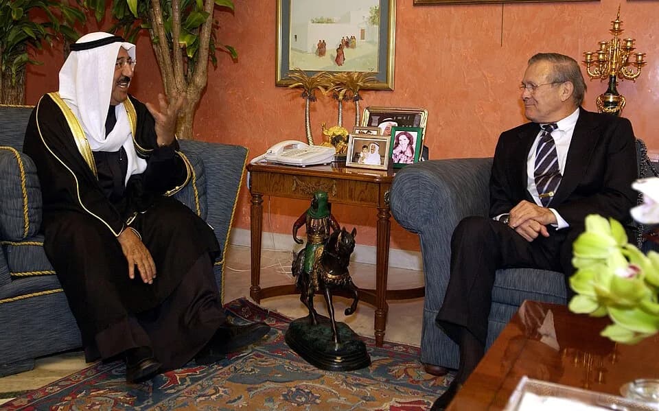 Sabah Al-Ahmad Al-Jaber Al-Sabah - Secretary of Defense Donald H. Rumsfeld (right) and Kuwaiti Prime Minister Sabah Al-Ahmad Al-Jabar Al-Sabah discuss defense issues at the palace in Kuwait on Feb. 22