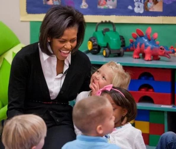 Dr. Seuss - During a reading of Dr. Seuss's 'Cat in the Hat' Mrs. Michelle Obama and 5-year-olds at the Prager Child Development Center at Ft. Bragg, N.C., enjoy each other's company during the First