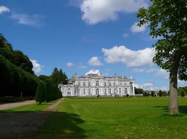 Isaac Singer - Oldway Mansion Here on a beautiful July day, being used for a wedding. It was built by the Singer family (of sewing machine fame). Isadora Duncan, the dancer tragically killed in a fre