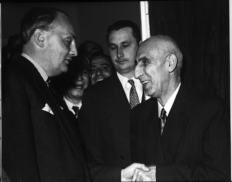 Gladwyn Jebb - Prime Minister Mohammad Mossadegh of Iran shaking hands with Sr. Gladwyn Jebb at the United Nations Security Council in New York City. From photograph album "Visit of his Excellency Moh