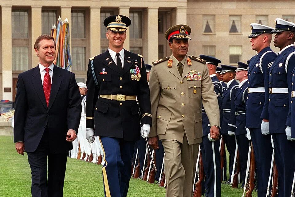 Mohamed Hussein Tantawi - Minister of Defense of Egypt Field Marshal Mohamed Hussein Tantawi (right) is escorted by Commander of Troops Lt. Col. Mark Armstrong (center), U.S. Army, and Secretary of De