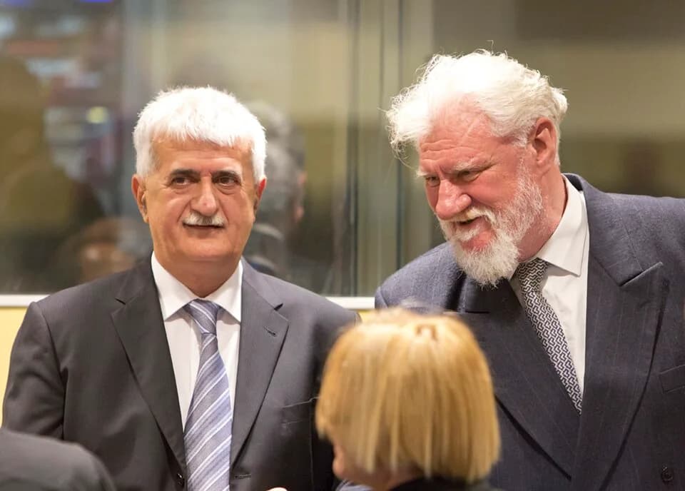 Slobodan Praljak - Bruno Stojić and Slobodan Praljak at the Prlić Trial Judgement in 2013.