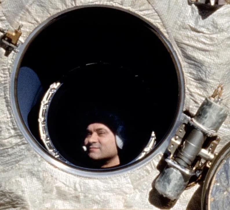 Valeri Polyakov - Cosmonaut Valeriy V. Polyakov, who boarded Russia's Mir space
station on January 8, 1994, looks out Mir's window during rendezvous operations with the Space Shuttle Discovery.