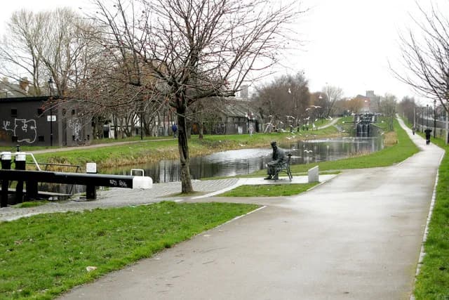 Brendan Behan - The Royal Canal at Drumcondra Road Lower, Dublin, Ireland The Royal Canal was opened in 1796 and joins the River Liffey to the River Shannon. The seated figure is a statue of Brendan
