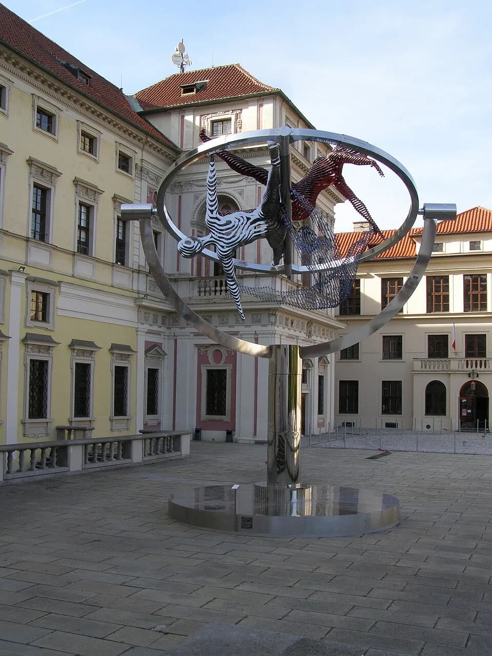 Věra Čáslavská - The statue of Věra Čáslavská is a distinctive, non-controversial, moving steel statue in the colours of the Czech tricolour by Czech artist David Černý, dedicated to the honour and me