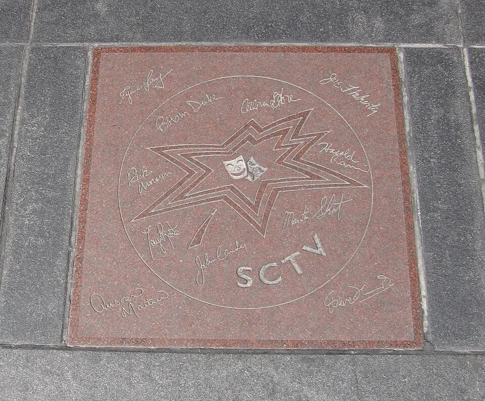 Joe Flaherty - Star on Canada's Walk of Fame for the comedy troupe SCTV. Signatures in inner circle, clockwise from top left: Robin Duke, Catherine O'Hara, Harold Ramis, Martin Short, John Candy, Tony