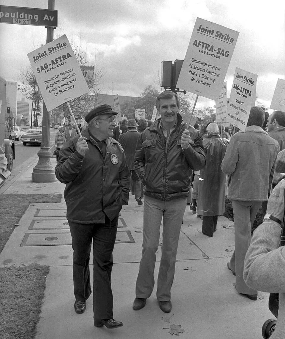 Ed Asner - ON THE LINE--Actors Ed Asner, left, Dennis Weaver picket on Wilshire Blvd. as they join in a strike against ad agencies.