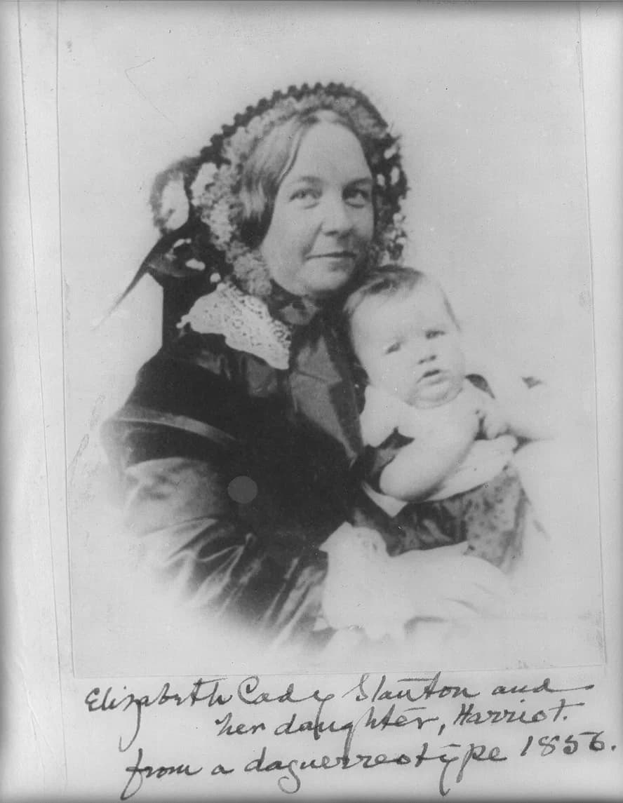 Elizabeth Cady Stanton - Elizabeth Cady Stanton holding her daughter Harriot, half-length portrait, facing right. (cropped)
