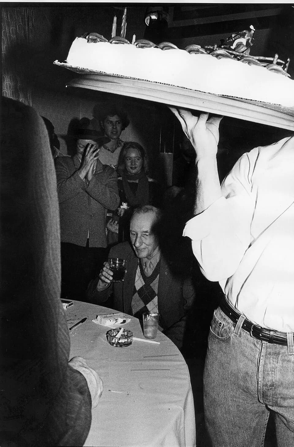 William S. Burroughs - William S. Burroughs receiving his Birthday cake in 1983, aged 70.burroughs1983