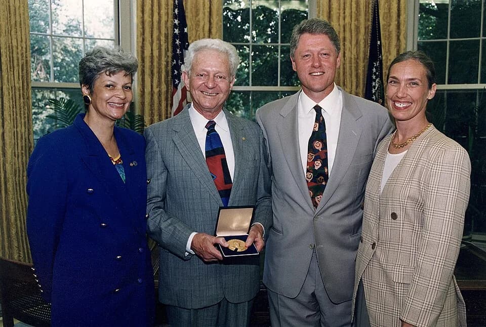 Leon M. Lederman - Left to Right:. Secretary of Energy Hazel R. O'Leary, Dr. Leon M. Lederman, President William Clinton, and Mrs. Leon Lederman.
For more information or additional images, please con