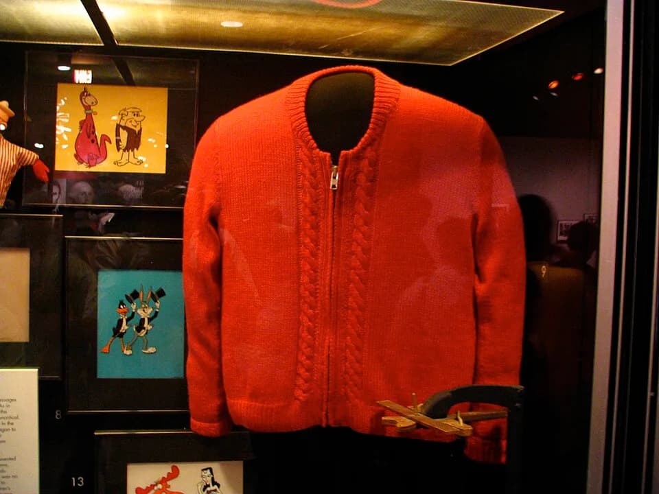Fred Rogers - Hand-made sweater worn by Fred Rogers, on display in the Smithsonian Institution's Museum of American History. Fred Rogers' mother, Nancy Rogers, knitted all the sweaters he wore on the