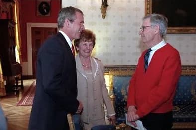 Fred Rogers - President George W. Bush greets Mister Rogers in the Blue Room before an early childhood education event in the East Room April 3, 2002.